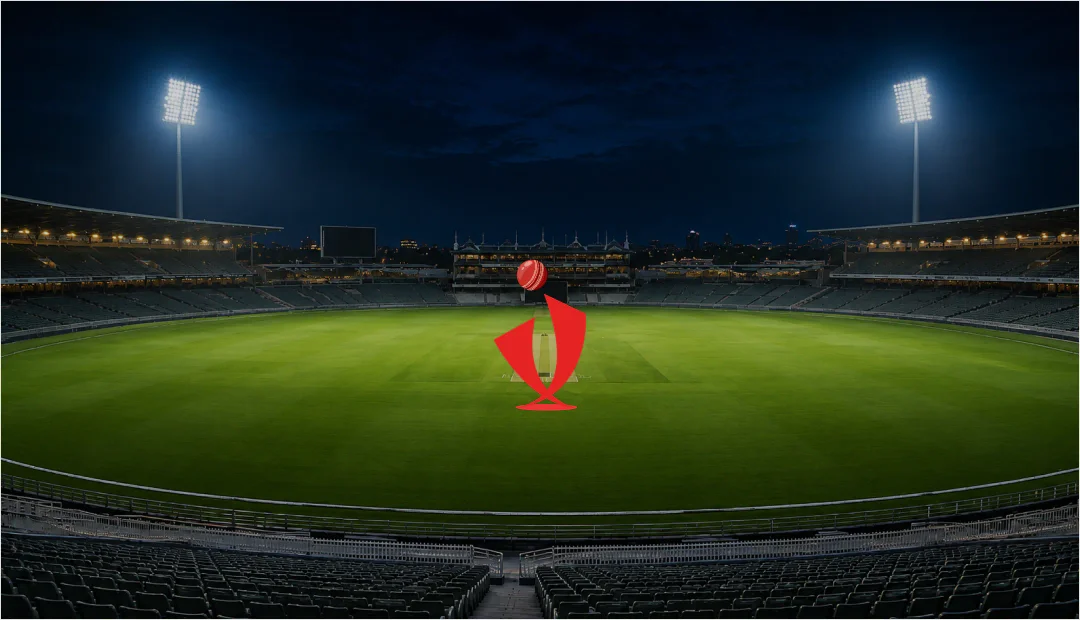 Impact11 branding over a floodlit cricket stadium at night.