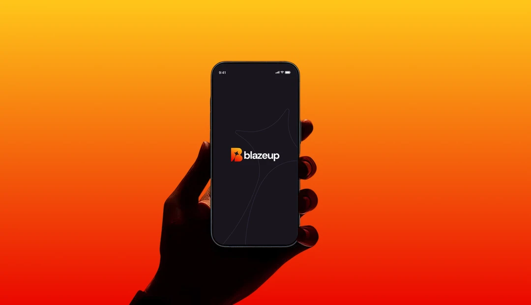 The Blazeup mark on a phone, held against the brand's yellow to red gradient.